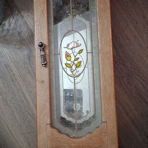 Elegant Wooden Wall Cabinet with Stained Glass Design